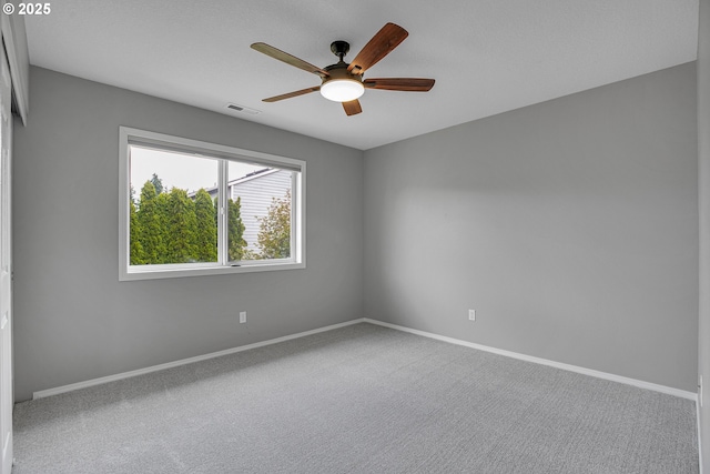 16099 SE Venice Ridge Way, Damascus, OR 97089 - spare room featuring a ceiling fan and carpet flooring
