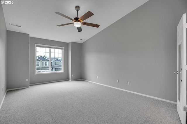 16099 SE Venice Ridge Way, Damascus, OR 97089 - carpeted empty room featuring vaulted ceiling and a ceiling fan
