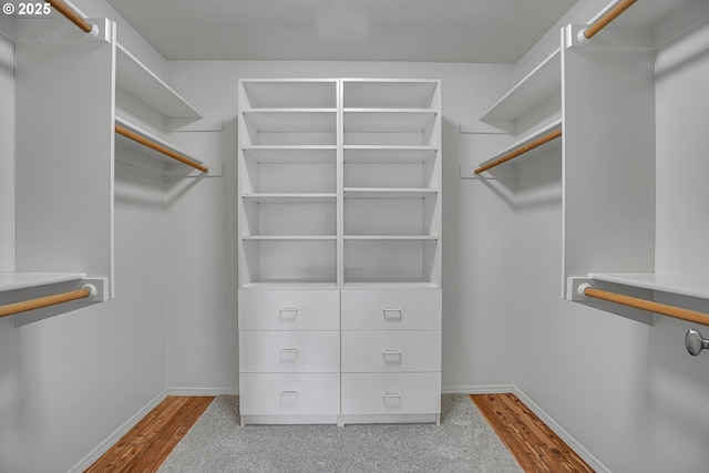 16099 SE Venice Ridge Way, Damascus, OR 97089 - walk in closet featuring wood finished floors