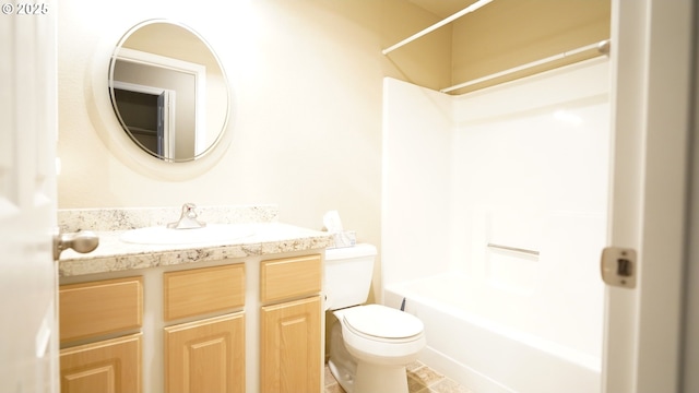 full bath featuring bathtub / shower combination, vanity, and toilet