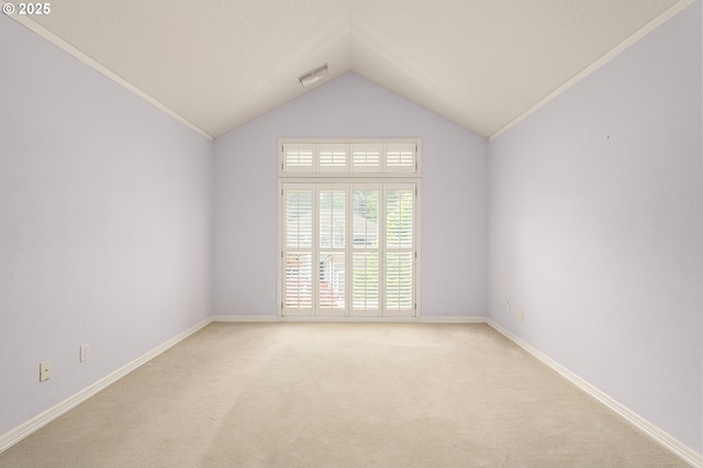 1318 NW Slocum Way, Portland, OR 97229 - spare room with ornamental molding, vaulted ceiling, light carpet, and baseboards