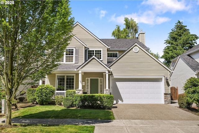2475 NE 10th Ave, Hillsboro, OR 97124 - view of front of home featuring driveway, a chimney, a front yard, stone siding, and roof with shingles