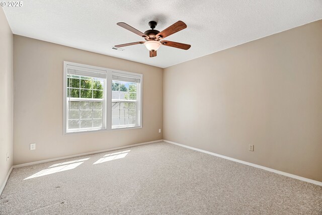 2475 NE 10th Ave, Hillsboro, OR 97124 - unfurnished room featuring carpet flooring, ceiling fan, a textured ceiling, and baseboards