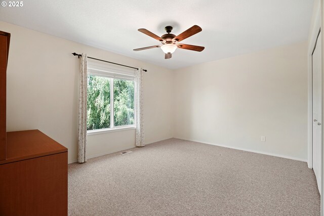2475 NE 10th Ave, Hillsboro, OR 97124 - carpeted empty room with a ceiling fan and baseboards