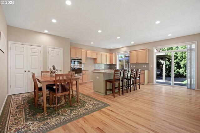 2475 NE 10th Ave, Hillsboro, OR 97124 - dining room with recessed lighting, light wood-style floors, and plenty of natural light