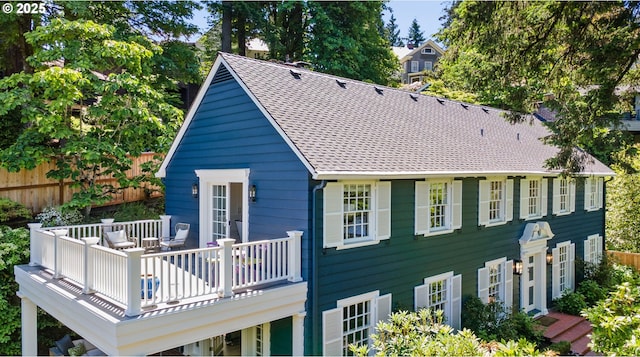 2505 SW Hillcrest Dr, Portland, OR 97201 - rear view of property featuring a wooden deck and a shingled roof