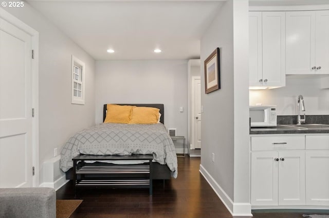2505 SW Hillcrest Dr, Portland, OR 97201 - bedroom featuring a sink, dark wood finished floors, recessed lighting, and baseboards