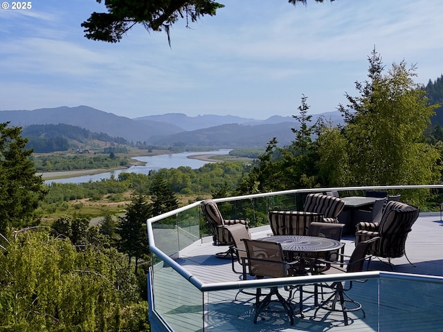 94414 Tom Cat Hill Rd, Gold Beach, OR 97444 - view of mountain background with a large body of water and a heavily wooded area