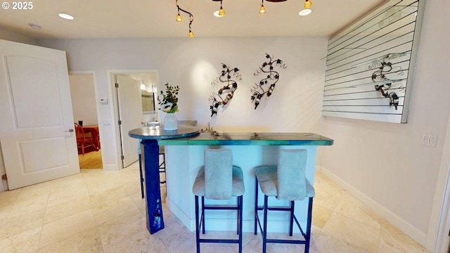 94414 Tom Cat Hill Rd, Gold Beach, OR 97444 - bar area with baseboards and light tile patterned floors