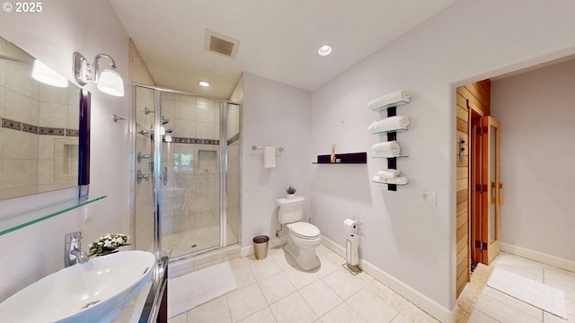 94414 Tom Cat Hill Rd, Gold Beach, OR 97444 - bathroom featuring a shower stall, tile patterned flooring, and recessed lighting
