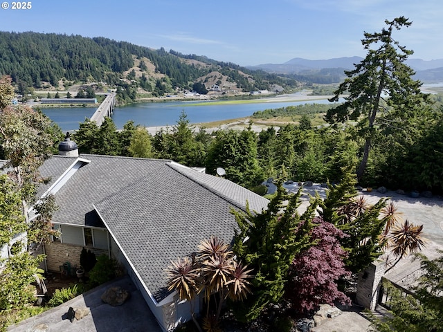 94414 Tom Cat Hill Rd, Gold Beach, OR 97444 - aerial view of a forest and a water and mountain view