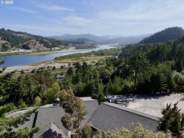 94414 Tom Cat Hill Rd, Gold Beach, OR 97444 - view of mountain backdrop featuring a nearby body of water