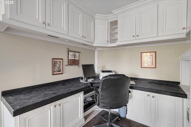 home office featuring built in study area