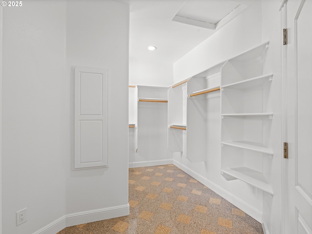 9540 SE Spyglass Dr, Happy Valley, OR 97086 - walk in closet with tile patterned floors and attic access
