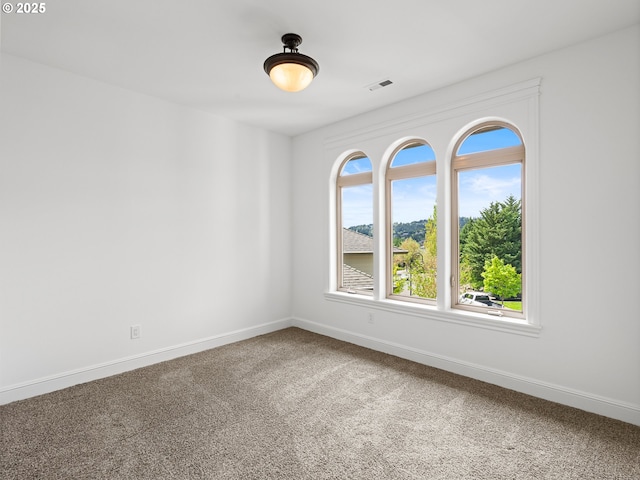 9540 SE Spyglass Dr, Happy Valley, OR 97086 - carpeted spare room featuring baseboards and visible vents