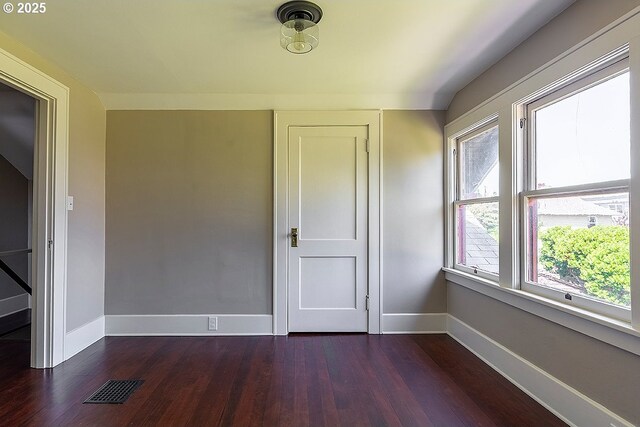 4915 NE 8th Ave, Portland, OR 97211 - spare room featuring baseboards and dark wood finished floors