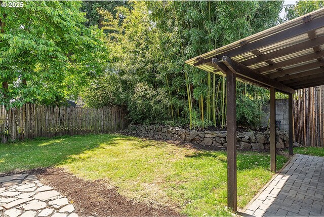 4915 NE 8th Ave, Portland, OR 97211 - fenced backyard featuring a patio area