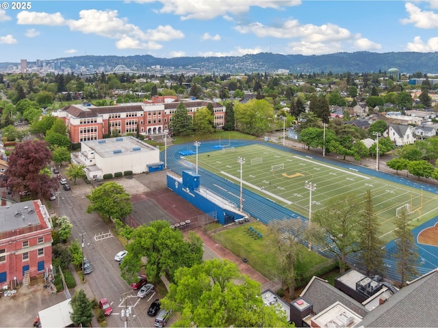 drone / aerial view featuring a mountain view