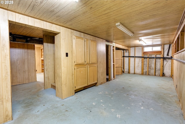 basement featuring wooden ceiling