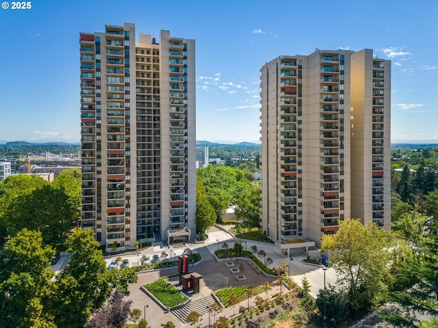 view of building exterior featuring a mountain view