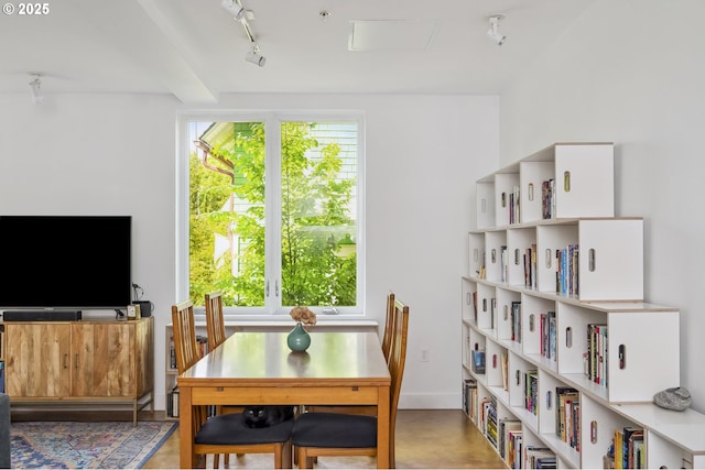 325 NE Graham St Unit 8, Portland, OR 97212 - dining room featuring baseboards