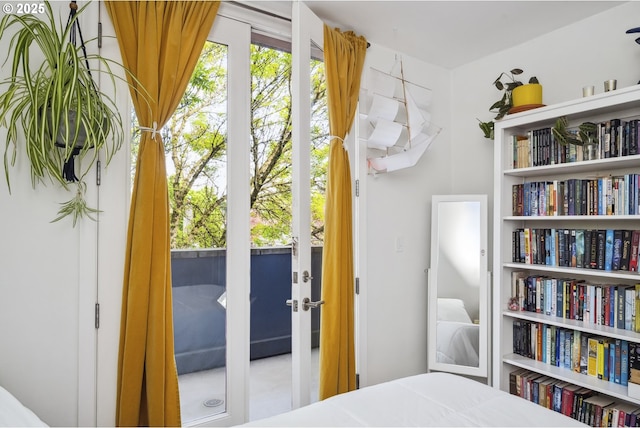 325 NE Graham St Unit 8, Portland, OR 97212 - bedroom featuring french doors