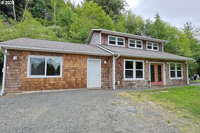 66663 Gunderson Rd, North Bend, OR 97459 - view of front of property with french doors and roof with shingles