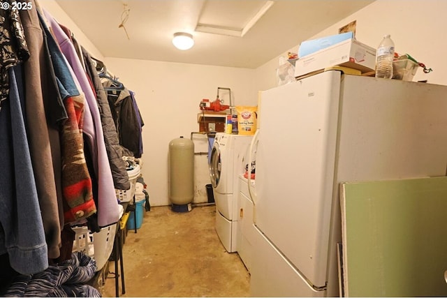 66663 Gunderson Rd, North Bend, OR 97459 - washroom with washer and clothes dryer and attic access