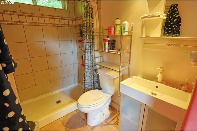66663 Gunderson Rd, North Bend, OR 97459 - full bath with a tile shower, tile patterned floors, and vanity
