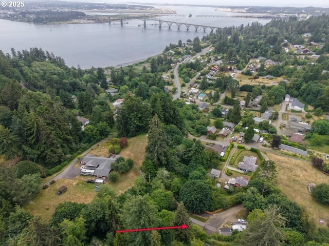 66663 Gunderson Rd, North Bend, OR 97459 - aerial view of property and surrounding area featuring a notable bridge and a nearby body of water