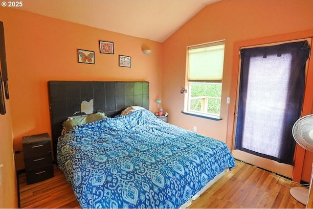 66663 Gunderson Rd, North Bend, OR 97459 - bedroom with wood finished floors and vaulted ceiling