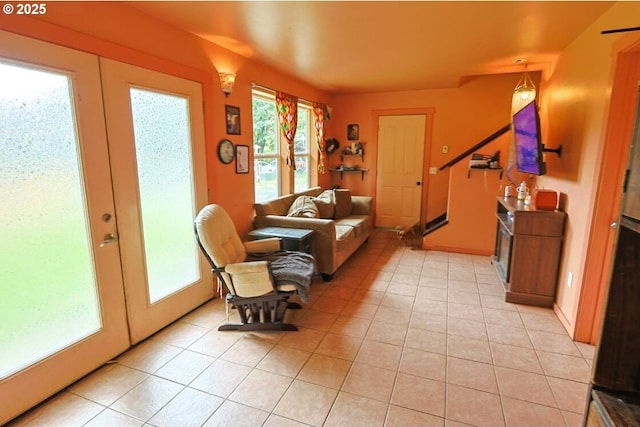 66663 Gunderson Rd, North Bend, OR 97459 - living room with light tile patterned floors and french doors