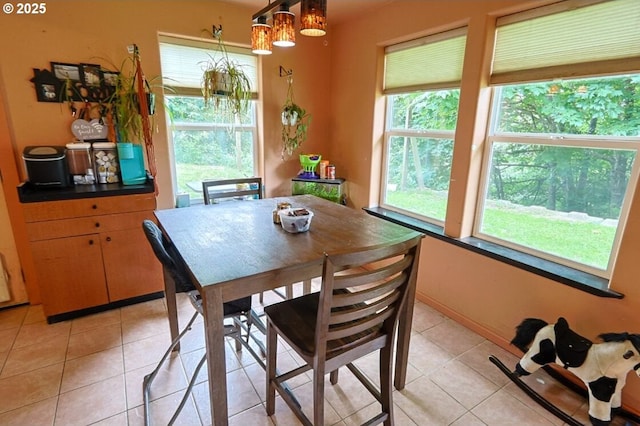 66663 Gunderson Rd, North Bend, OR 97459 - dining area featuring light tile patterned floors