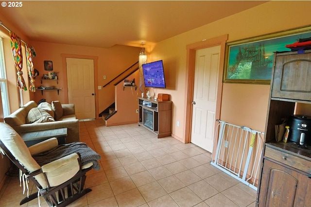 66663 Gunderson Rd, North Bend, OR 97459 - living area with stairway and light tile patterned floors