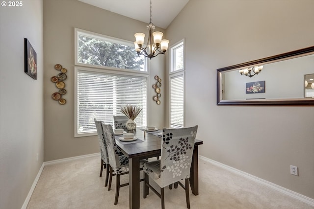 15463 NW Andalusian Way, Portland, OR 97229 - dining space with a chandelier, light carpet, and baseboards