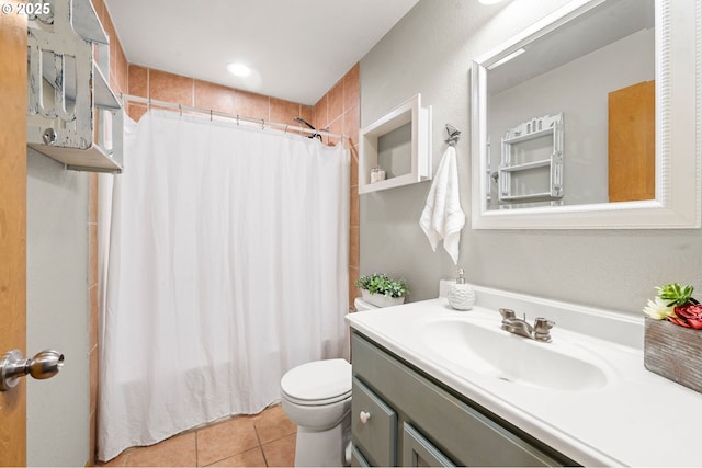 1313 Wakeman Ln, Gearhart, OR 97138 - bathroom with vanity, toilet, tile patterned flooring, and shower / bath combo with shower curtain