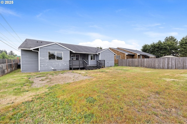 1313 Wakeman Ln, Gearhart, OR 97138 - back of property featuring a deck, crawl space, and roof with shingles