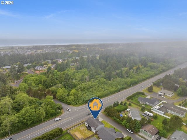 1313 Wakeman Ln, Gearhart, OR 97138 - aerial overview of property's location with a forest