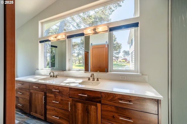 760 Carter St SW, Bandon, OR 97411 - full bathroom featuring double vanity and lofted ceiling