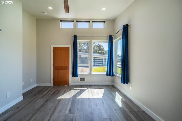 760 Carter St SW, Bandon, OR 97411 - spare room with wood finished floors, plenty of natural light, baseboards, recessed lighting, and ceiling fan