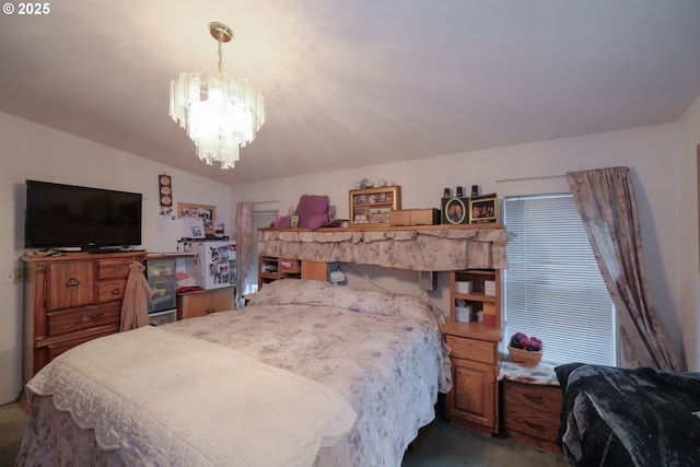 bedroom with an inviting chandelier