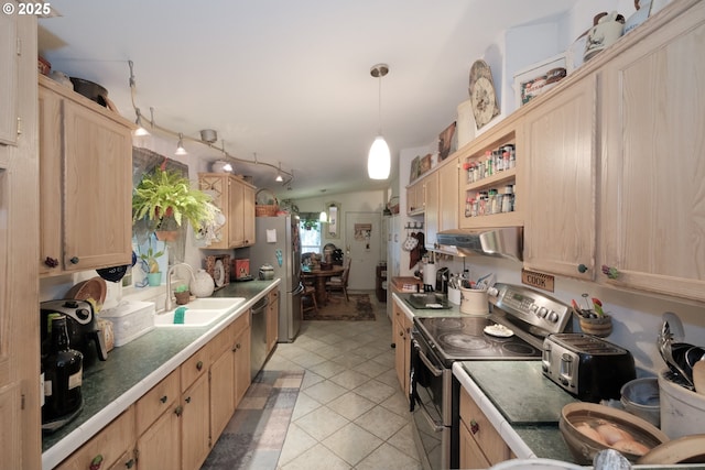 kitchen featuring sink, decorative light fixtures, light tile patterned floors, light brown cabinets, and appliances with stainless steel finishes