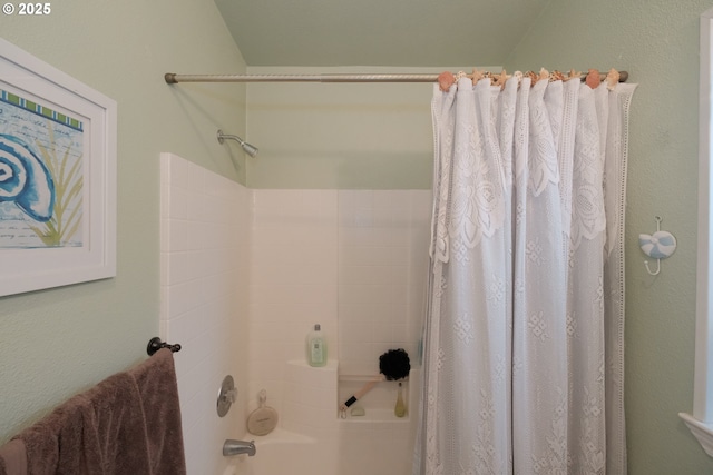 bathroom featuring shower / bath combination with curtain