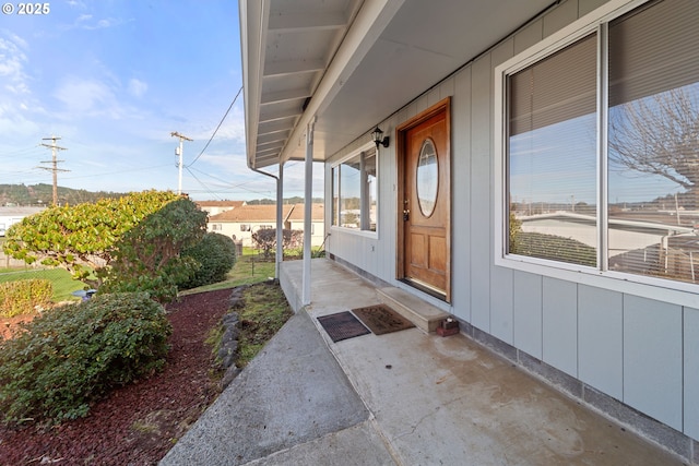 entrance to property with covered porch