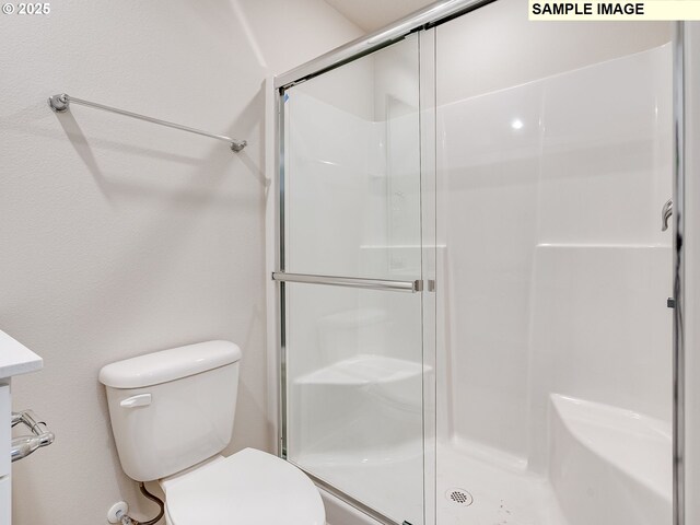 2133 NE 4th Ave, Battle Ground, WA 98604 - full bath featuring a shower stall and toilet