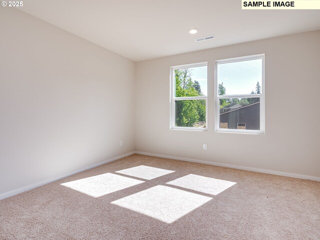 2133 NE 4th Ave, Battle Ground, WA 98604 - carpeted spare room featuring baseboards and recessed lighting