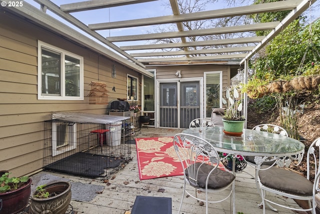 view of patio / terrace with a wooden deck and a pergola