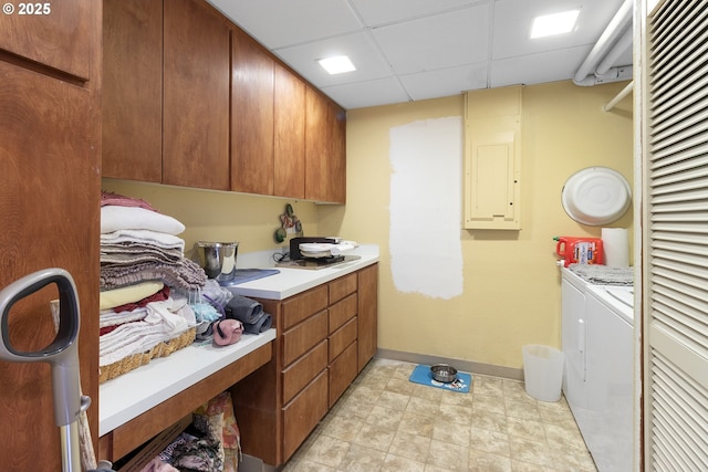 washroom with washing machine and clothes dryer