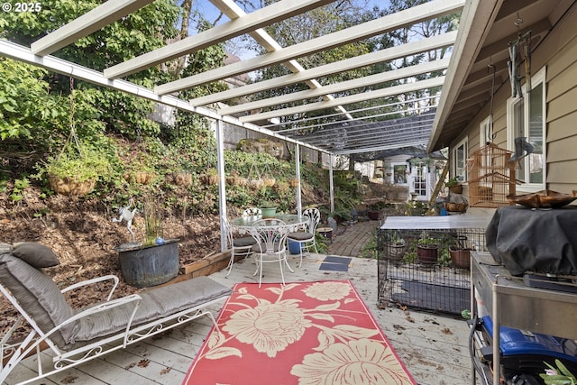 view of patio with a grill, a deck, and a pergola