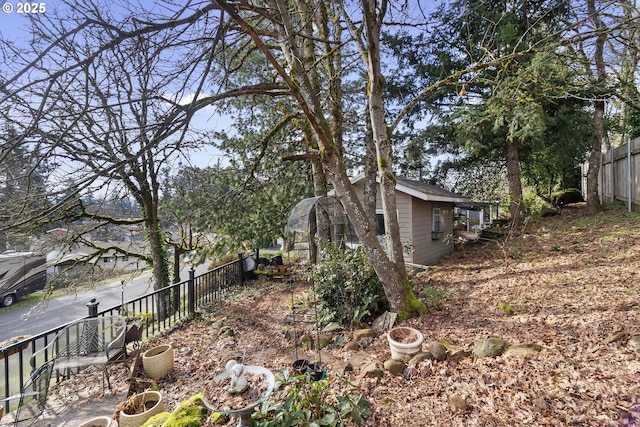 view of yard with an outdoor structure